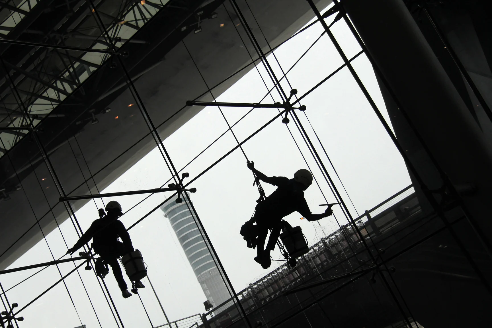 Window Cleaners cleaning the building